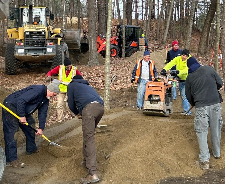 Volunteers build pump track