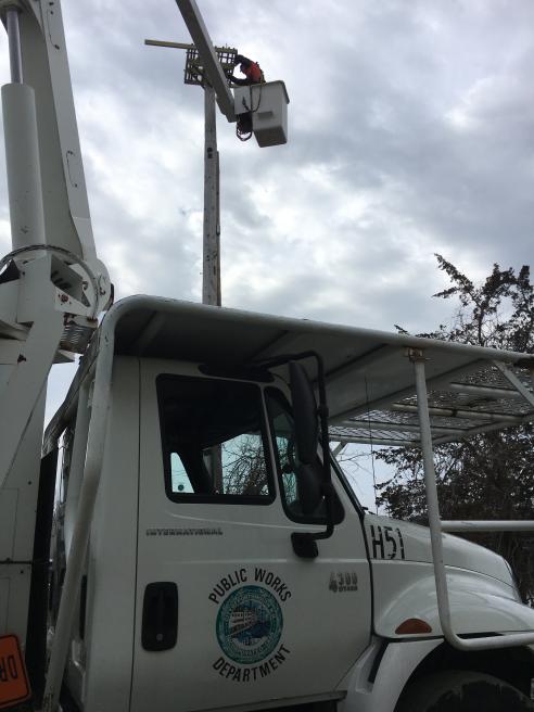 Crews installing bird platform