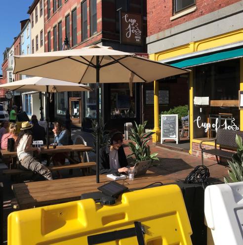 Parking spaces converted to outdoor dining on Market Street.