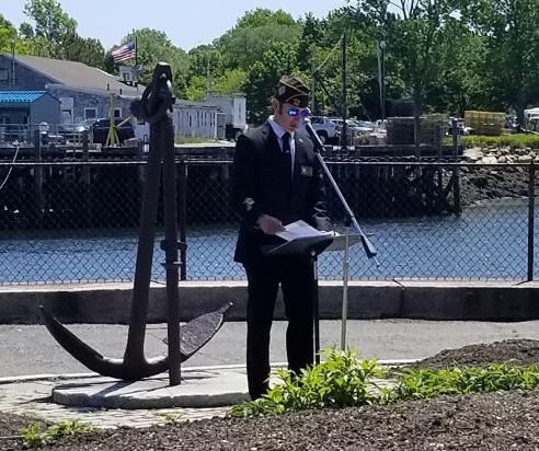 VFW/American Legion Post Commander Josh Denton conducts Wreath-laying Ceremony